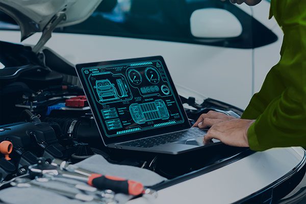 why car diagnostics car-mechanic-using-laptop-computer-examining-tuning-car-diagnostics