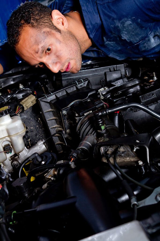 mechanic-fixing-diesel-engine-e-car-menlyn