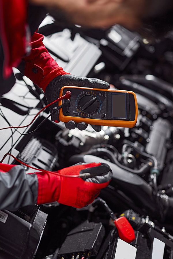 mechanic checking car battery at e car menlyn motors pretoria